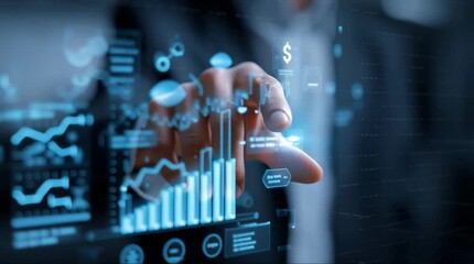 A person's hand interacting with a futuristic holographic display showing financial charts and data. - Powered by Adobe
