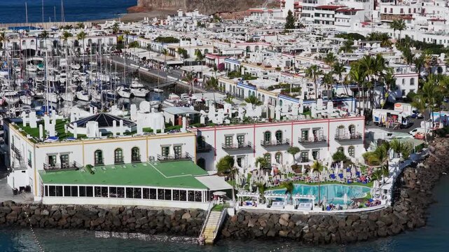 Puerto de Mog&aacute;n Marina and Little Venice White Village, Gran Canaria, Canary Islands - 4K Cinematic Aerial