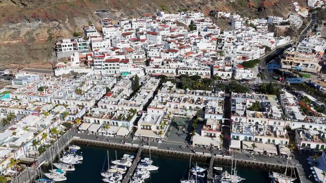 Puerto de Mog&aacute;n Marina and Little Venice White Village, Gran Canaria, Canary Islands - 4K Cinematic Aerial