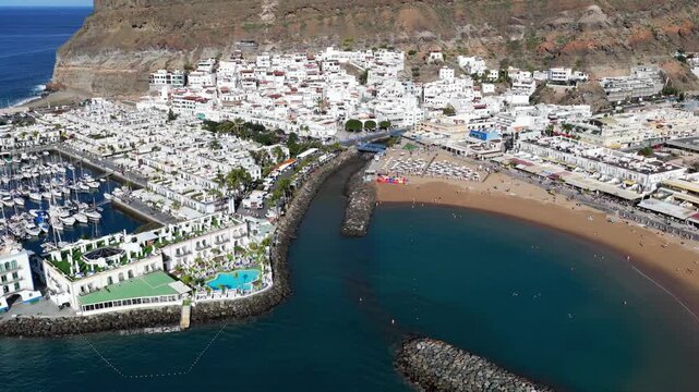 Puerto de Mog&aacute;n Marina and Little Venice White Village, Gran Canaria, Canary Islands - 4K Cinematic Aerial