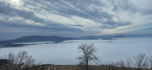 Mystical panorama from the Republic of San Marino with fog and clouds
