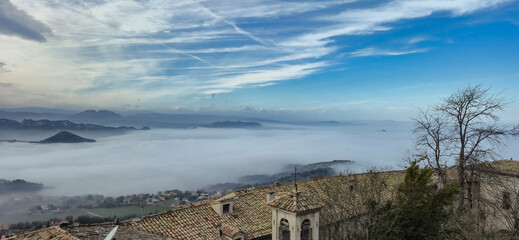 Mystical panorama from the Republic of San Marino with fog and clouds