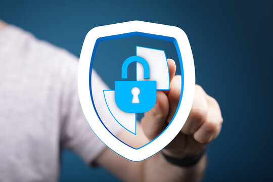Person's hand touching digital security icon. Secure padlock shield representing online protection, data safety, and cybersecurity. P - Powered by Adobe
