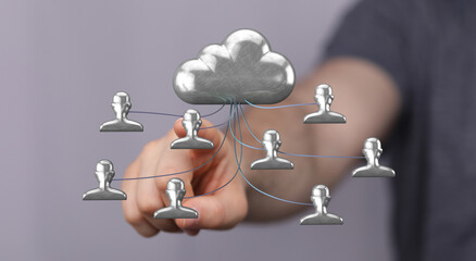 Hand pointing towards a cloud symbolizing data storage and people representing connectivity and collaboration.