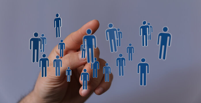 Abstract design of human icons connected by hand, representing connection, social network and global communicat - Powered by Adobe