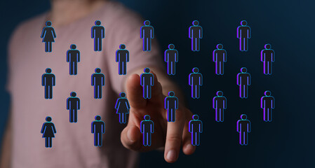 Hand touching digital people symbolizing connection, network, and communication in the virtual world.