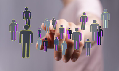 A hand pointing towards a collection of stylized human figures, symbolizing connection, global community, and networking, emphasizing team and t