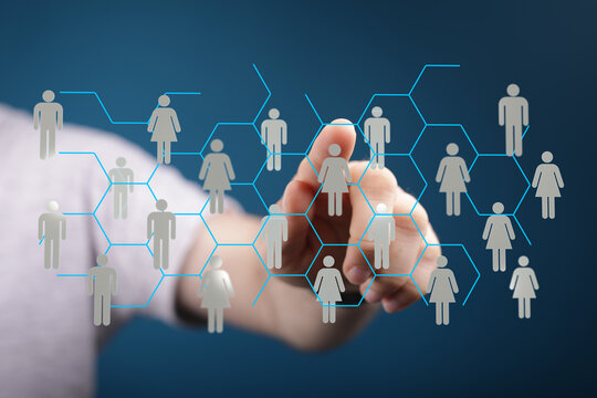 Hand interacting with digital network of people. Modern business teamwork, connection and communication. Technology and community concept. - Powered by Adobe