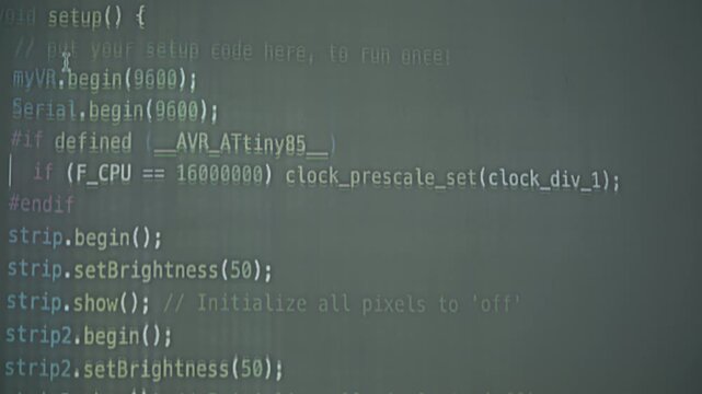Highlighted programming lines showing voice-activated commands for robot interaction, used in STEM AI education and embedded systems.