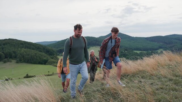 Multigenerational family on hiking trip in nature.