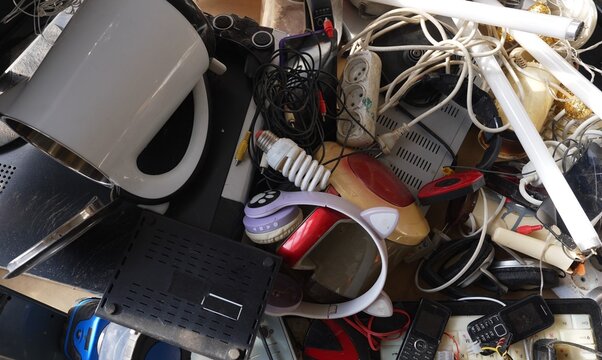 E-waste recycling center. Broken and outdated electronic and household appliances