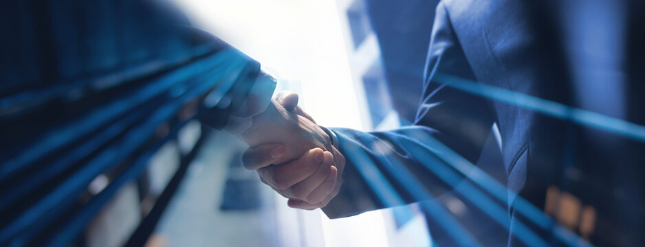 Businessmen making handshake with partner, greeting, dealing, merger and acquisition, business cooperation concept, for business, finance and investment background, teamwork and successful business - Powered by Adobe