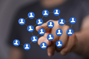 Connecting people, representing digital network and social media connections, hand touching global...