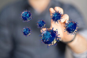 Artistic depiction of Covid-19 molecules floating near a hand. Illustrates scientific concepts, healthcare, an