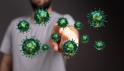 Hand pointing towards virus cells, representing the fight against infection, with concept of...