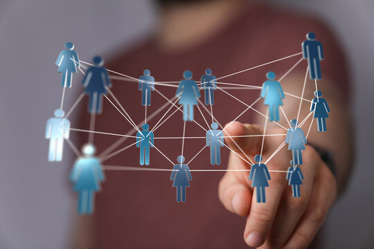 Concept of social network and global connections and teamwork. Hand pointing at a digital network. Communicatio - Powered by Adobe