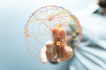 Close up of a hand touching a network globe. Representing technology, connections, and global communication with data and information