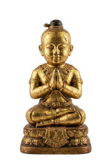 Golden Kuman Thong statue sitting in prayer isolated. Traditional Thai amulet.