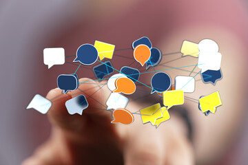 Hand interacting with digital speech bubbles in a cloud. Representing communication,  sharing, networking and t
