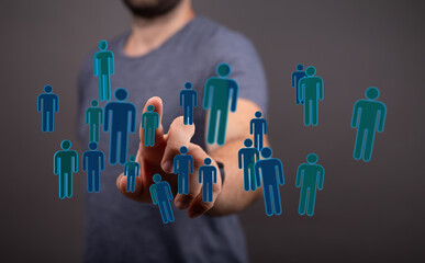 Hand interacting with digital people icons, representing social connection, networking, and online communities.