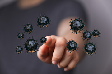 Abstract image of a hand pointing at or interacting with floating coronavirus particles. Symbolizes interactio