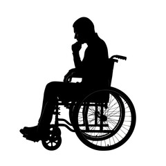 Silhouette of a man in a wheelchair deep in thought.