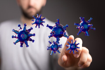 Concept of coronavirus digital illustration with a hand touching the virus. Prevention and...