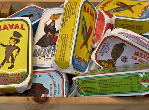 Portuguese canned fish with vintage labels in a wooden box
