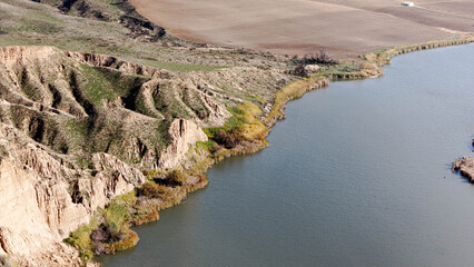 Drone photography Toledo Buruj&oacute;n cliffs lake textures relief bright scenic landscape travel