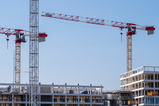 Wide panoramic construction site complex with tower crane and building development showing architecture urban engineering infrastructure property project