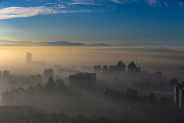Naklejka premium Heavy smog and fog in Almaty, Kazakhstan.