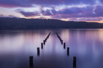 Sunset over lake with reflection in Lake District UK