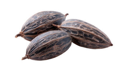 Three nuts rest on a stark black background natural snack items presented simply on dark surface