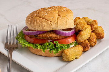 veggie burger  with broccoi tots