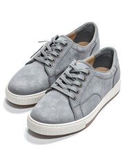 Pair of gray casual sneakers with white soles, laces
