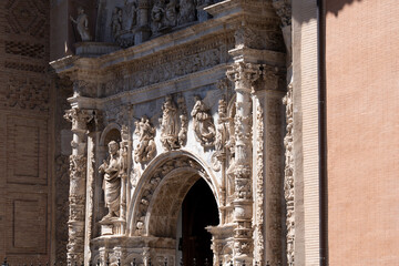 Intricate stone facade of a historic church entrance.. Collegiate Church of Santa María la Mayor,...