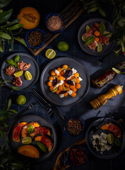 Italian dinner with melon prosciutto and feta salad