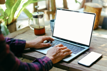 computer screen,mobile phone blank mockup.work using laptop texting mobile.white background for advertising,contact business search information on desk in cafe.marketing,design