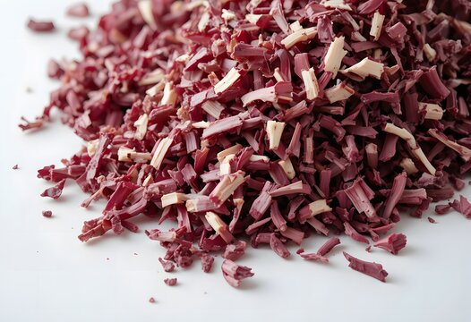 Vibrant crimson and off-white dried shredded beet pieces for culinary and health applications. beet pulp