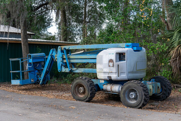 A man lift machine in a forest