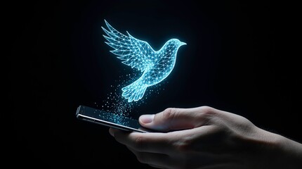Human hand holding a modern smartphone in a dark environment with a glowing blue holographic bird made of digital light particles emerges and floats upward.