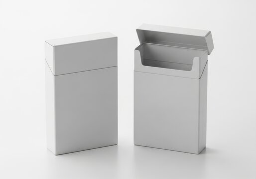 Two plain white cigarette packs one closed one open isolated on white background