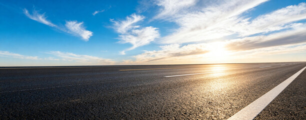 Asphalt Road with Blue Sky and Sunset