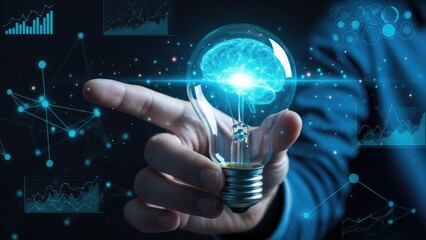 Hand holding glowing light bulb with brain icon symbolizing innovation and artificial intelligence.