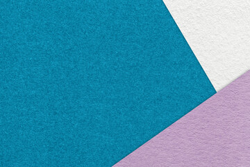 Abstract dark turquoise, white and pastel violet paper background with copy space. Template for presentation, banner