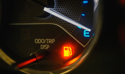 Low Fuel Warning Light on car Dashboard Display