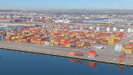AERIAL: Flying along the colorful Port of Los Angeles on a sunny spring day.