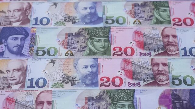 Georgia money, the georgian lari currency, banknotes of various denominations, financial transactions. Georgian money, the lari as a financial background for your design