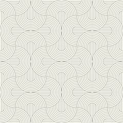 Vector seamless pattern. Stylish linear ornament with geometric arches. Regular monochrome texture featuring a grid of concentric semicircles. Basic essential surface design.
