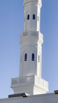A cinematic view of Masjid Al-Areesh in Makkah, featuring its iconic white architecture, towering minarets, and peaceful desert surroundings. Ideal for Islamic heritage content.
